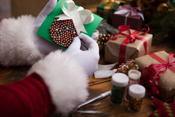 Santa's hands, make a wish list for Christmas night