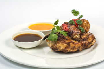 Baked chicken with herbs and sauce