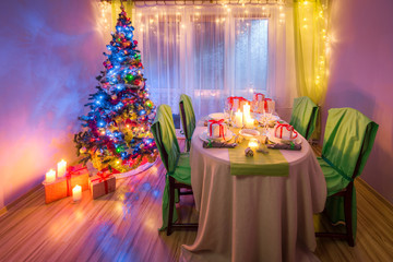 Christmas table setting during the frosty winter evening