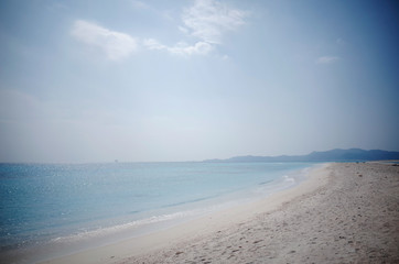 A calm sea in the early afternoon