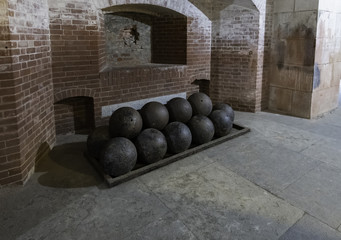 Cannon balls arranged in the Fort Point National Park
