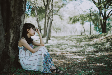 Naklejka premium Close up sad beautiful asian woman from unrequire love,she think so much about boyfriend,life without love