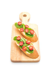 bread with rocket and tomatoes