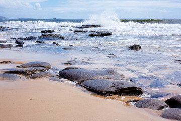 Mooloolaba Beach surf and rocks, Queensland, Australia