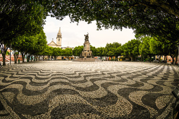 Praça do Largo de São Sebastião com Monumento abertura dos portos e igreja