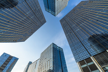 Modern office buildings against blue sky