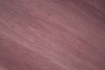 Diagonal wood texture. Stained wood. Oak veneer. red purple