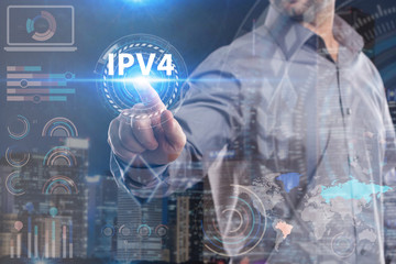 Business, Technology, Internet and network concept. Young businessman working on a virtual screen of the future and sees the inscription: IPv4