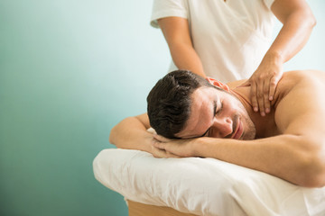 Fototapeta na wymiar Man getting a deep tissue massage