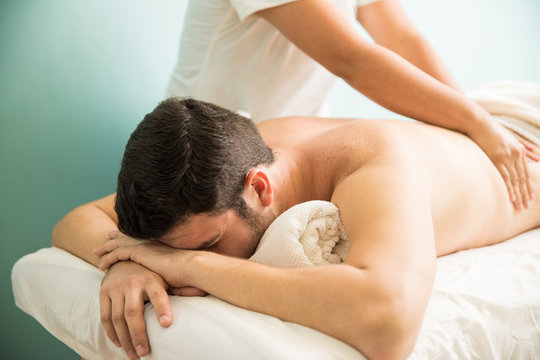 Man getting massage at a spa