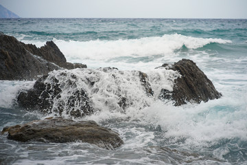 Wave hitting rock