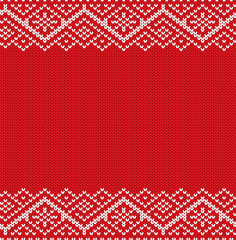 Fototapeta na wymiar Knitted red christmas geometric ornament. Winter seamless knit background with empty place for your text.