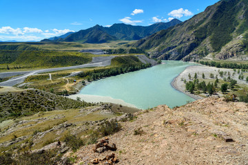 Fototapeta na wymiar View on confluence of rivers Katun and Chuya in mountains. Altai Republic, Russia