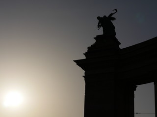 statue sunset