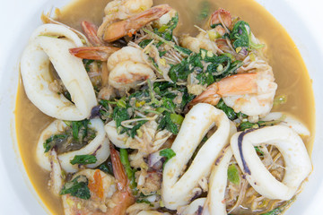 fried squid basil in white plate