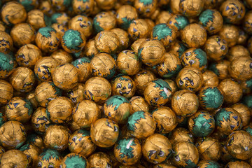 Isolated View of Halloween Trick or Treat Chocolate Candy - Pumpkins with Smiling Faces