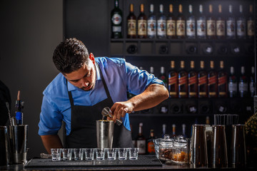 Bartender with jigger