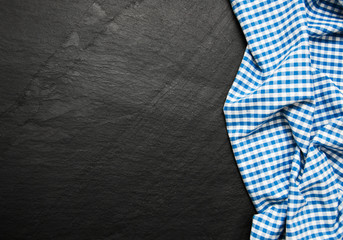 Checkered napkin on a black background