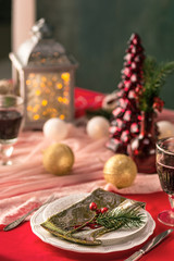 Beautiful Christmas table setting with decorations