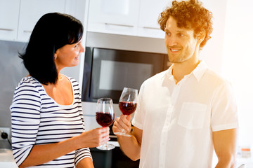 Portrait of a couple having a glass of red wine