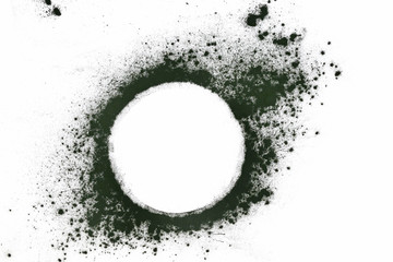 spirulina Mockup. mockup with dry dark green powder alga spirulina. round frame of green spirulina.  Flat lay, top view, copy space.