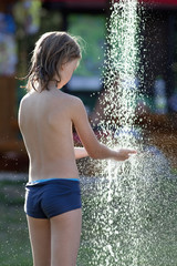 Boy Washing Hands at Outdoor Water Shower