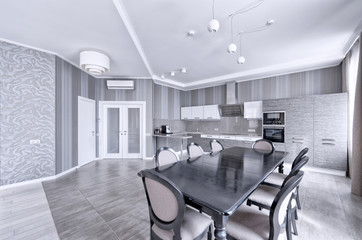 Interior of the kitchen-living room in a modern house.