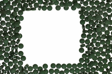 spirulina Mockup. mockup with alga spirulina in tablets. square frame of green spirulina tablets