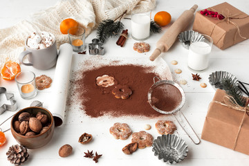 Fototapeta na wymiar Homemade bakery making, gingerbread cookies in form of Christmas tree close-up.
