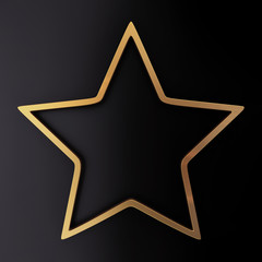 Gold star frame on black background