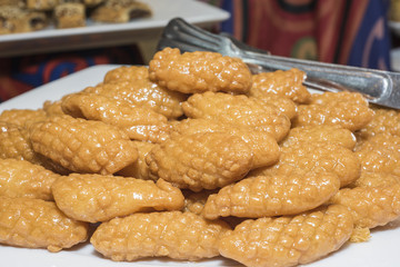Selction of sweet oriental pastries at a restaurant buffet