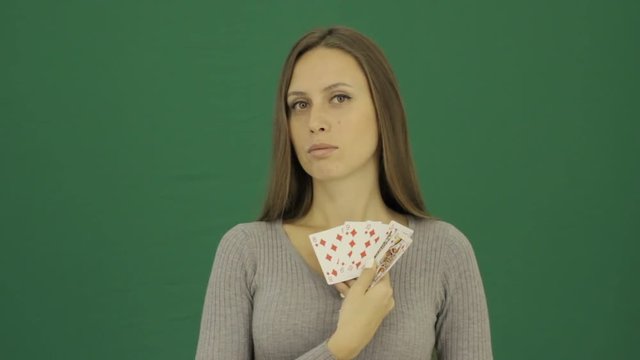 Young cute woman with playing cards, chromakey 
