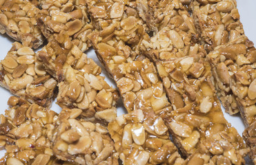 Selction of sweet oriental peanut crunch at a restaurant buffet