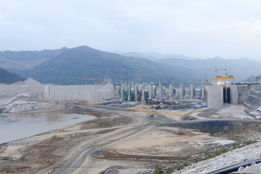 Constrution Workers at Heavy Construction Site, Building Dams, Xayaburri Dam, Xayaburi, Laos	
