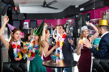Fototapeta premium Young friends dancing on birthday party