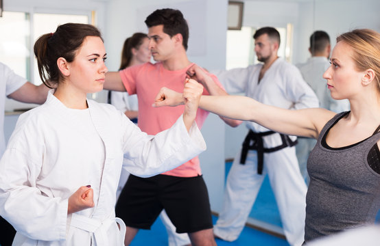 Adults training at karate class