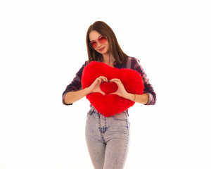 Young cute girl with heart, isolated  