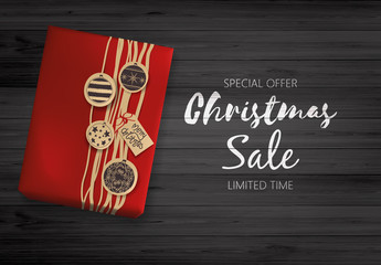 Christmas Sale Design. Lettering on Black Wooden Board with Giftbox