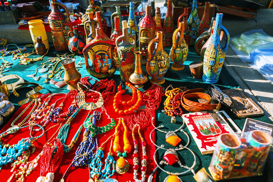 Tbilisi, Georgia - 08 October, 2016: Dry Bridge Flea market in Tbilisi sells Jewelry, Soviet, retro junk stuff, tableware set, dishes, souvenir georgian Clay jugs