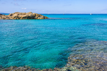 Transparent sea in Es Calo Cove in Formentera, Spain