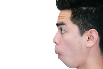 Fototapeta premium Close-up beside face handsome excited young isolated on white background. Human Face. Asia man people.