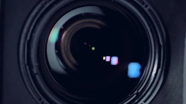 A macro view on a black camera lens. 