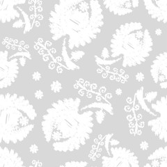 White flowers on a gray background. Embroidery texture. White Texture. Seamless vector background.