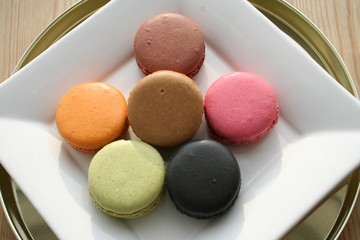 French Macarons in different tastes and colors - delicious to a cup of strong coffee