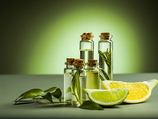 Lemon oil isolated on black table