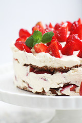 Cake with strawberries and cream