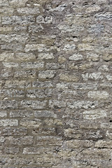 Close up of ancient yellow brick wall texture.