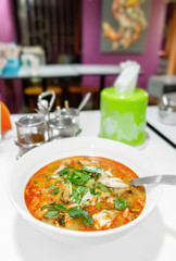 Thai cuisine, Tom Yum soup with seafood, hot and spicy clear soup is typical for Thailand.