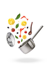 Pan with ingredients on white