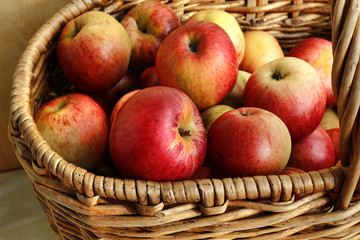 Bright tasty ripe apples in a basket